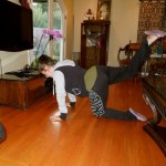 Move: Donkey Kick
Form: Come down on your hands and knees and push your foot towards the ceiling. Hold for a couple seconds.