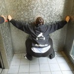 Move: Wall squat facing the wall (I did it in the elevator)-do as many as you can
Form: Stand as close to the wall as you can (my goal is to have my toes touching the wall-I starting having to be about a foot away from the wall) and squat down-try not to fall over backwards! This move forces you to keep your weight in your heels and prevents you from leaning forward. It will REALLY help you with your squat technique.