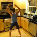 jumping jacks! You don't have to sit around while waiting for your water to boil. Get your body moving simply by doing some jumping jacks. Tighten your abs to bring your pelvis forward and take the curve out of your lower back.
