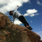 Side plank on the edge of a mountain! Shoulders engaged on the back, lower belly strong, inner thighs engaged. Epic.