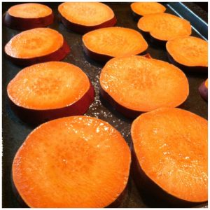 2. Preheat your oven to 350. Lightly coat a baking sheet with olive oil and lay out your sweet potatoes. Top them with a little oil. Bake for 40-50 minutes, or until pierced easily with a fork.